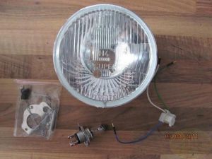 800163386' , 'Scheinwerfereinsatz H4 rund, 154mm,geprägtes Glas